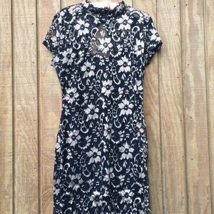 Black and gold lace dress